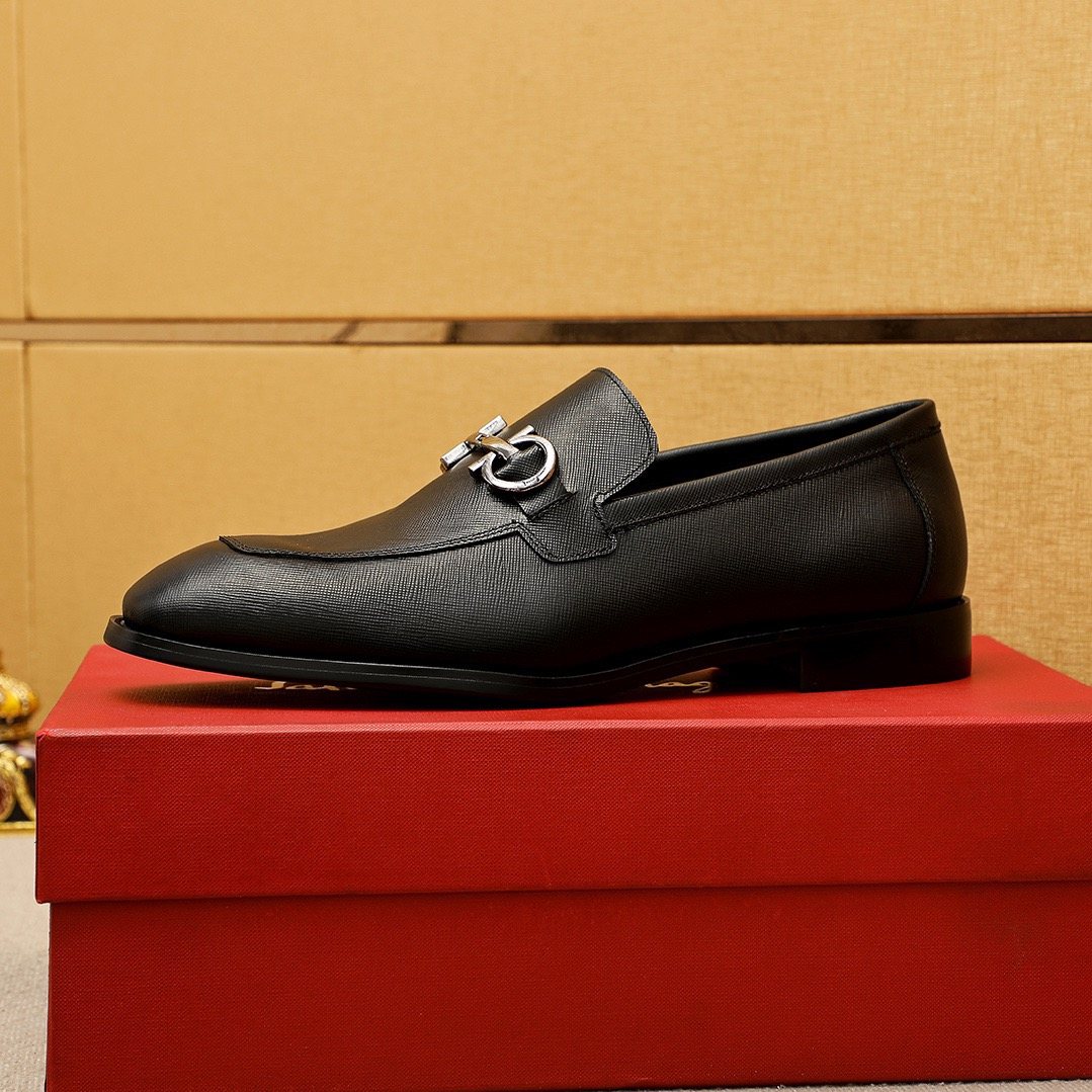 Ferragamo Black Hardware Loafers — hero