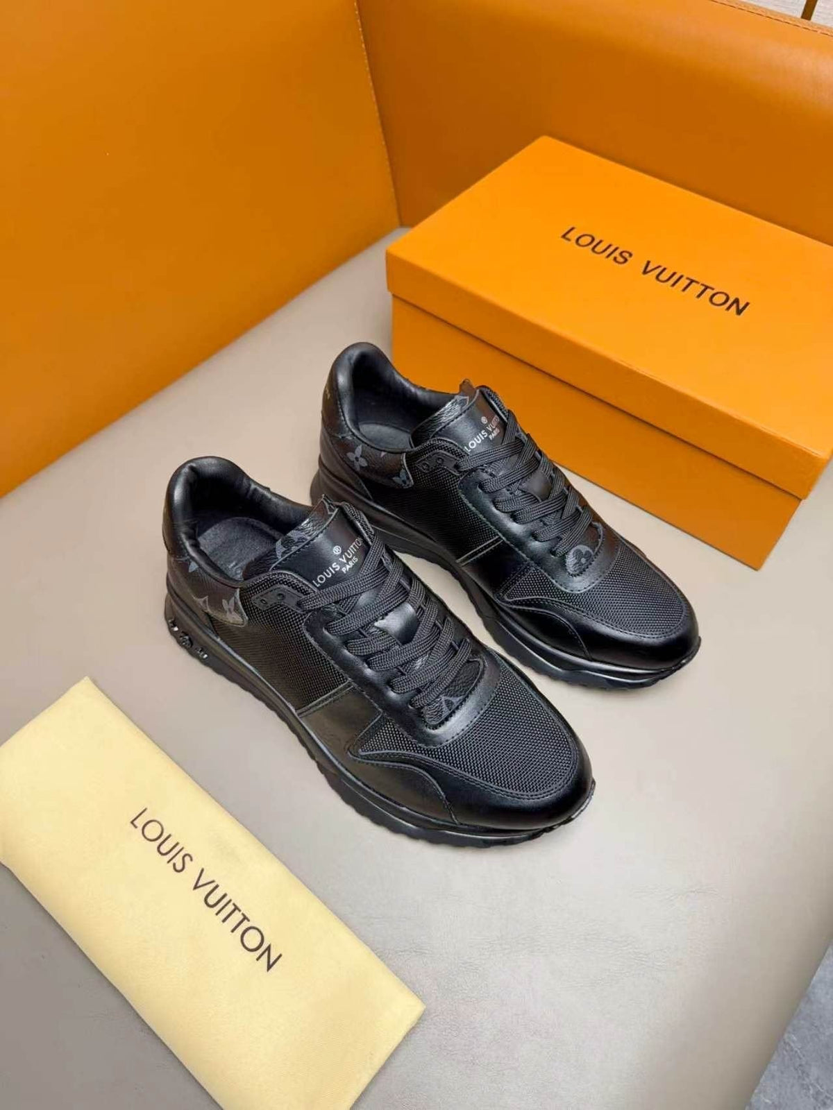Louis Vuitton Black Leather & Mesh Sneakers — front