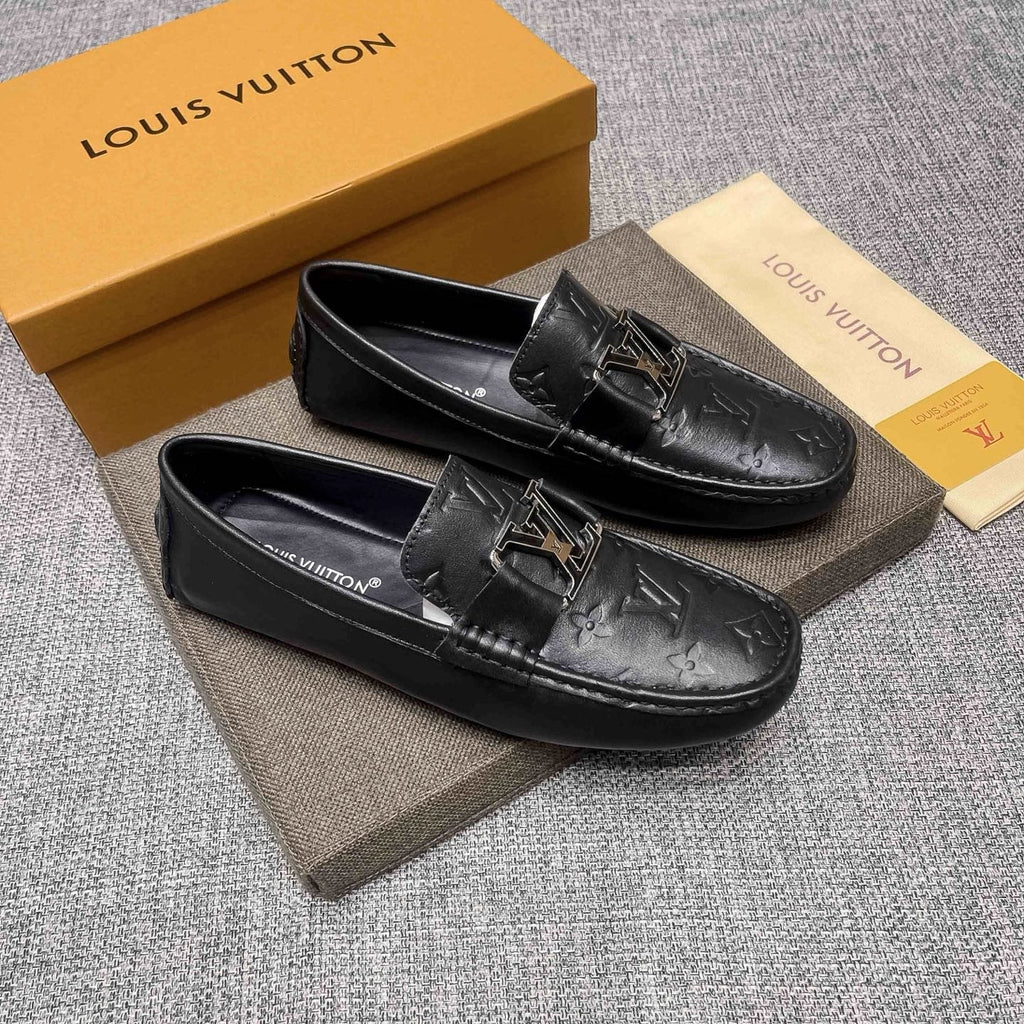 Louis Vuitton Black Metal-Accent Loafers — hero