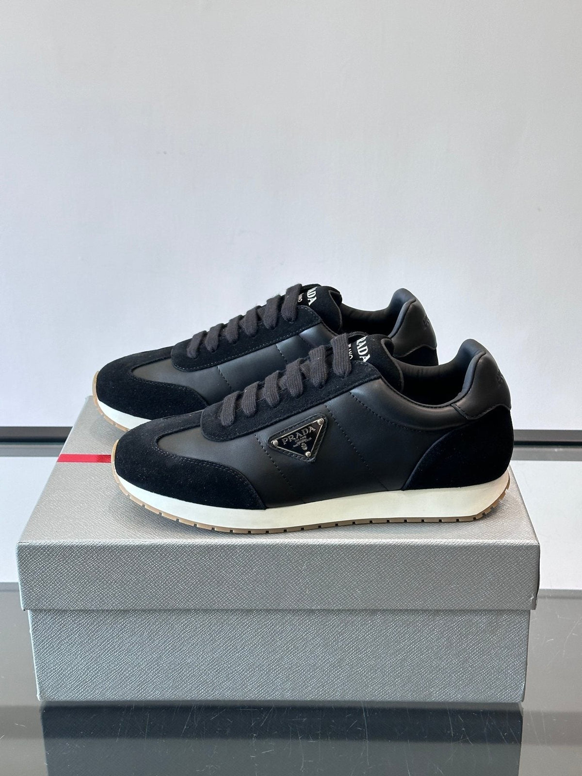 Prada Black Triangle Detail Sneakers — front