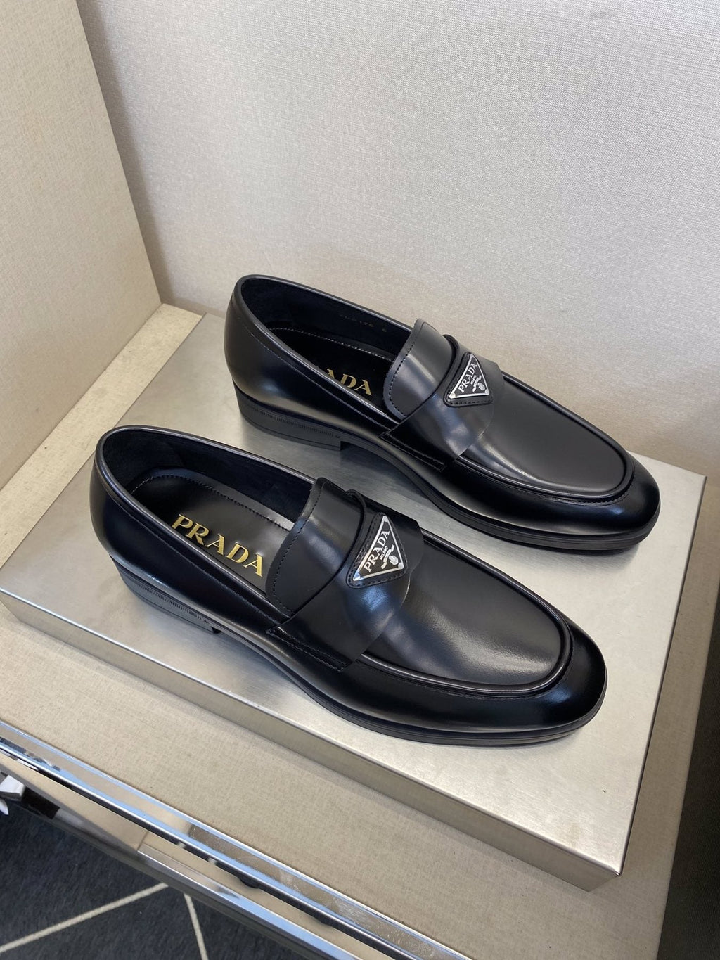 Prada Black Triangle Plaque Loafers — front