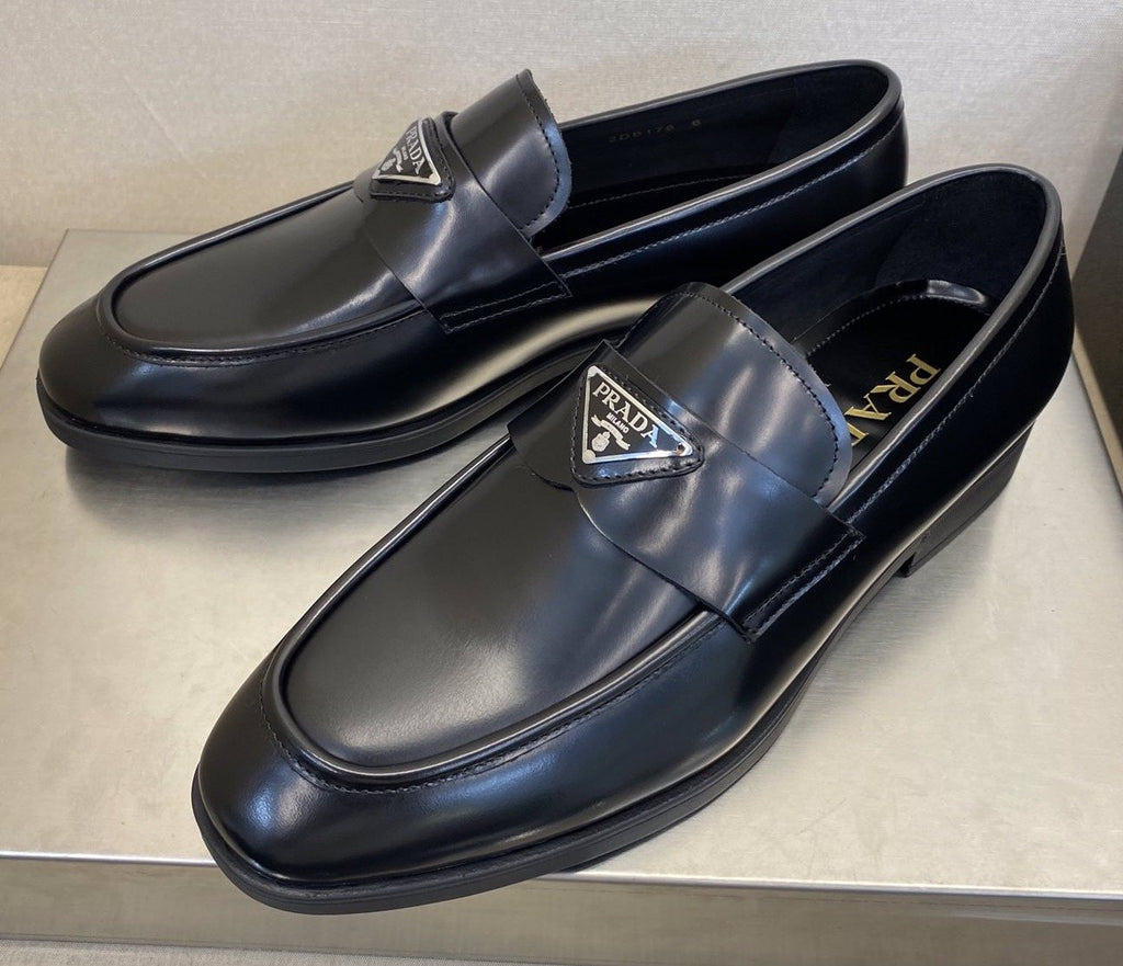Prada Black Triangle Plaque Loafers — hero