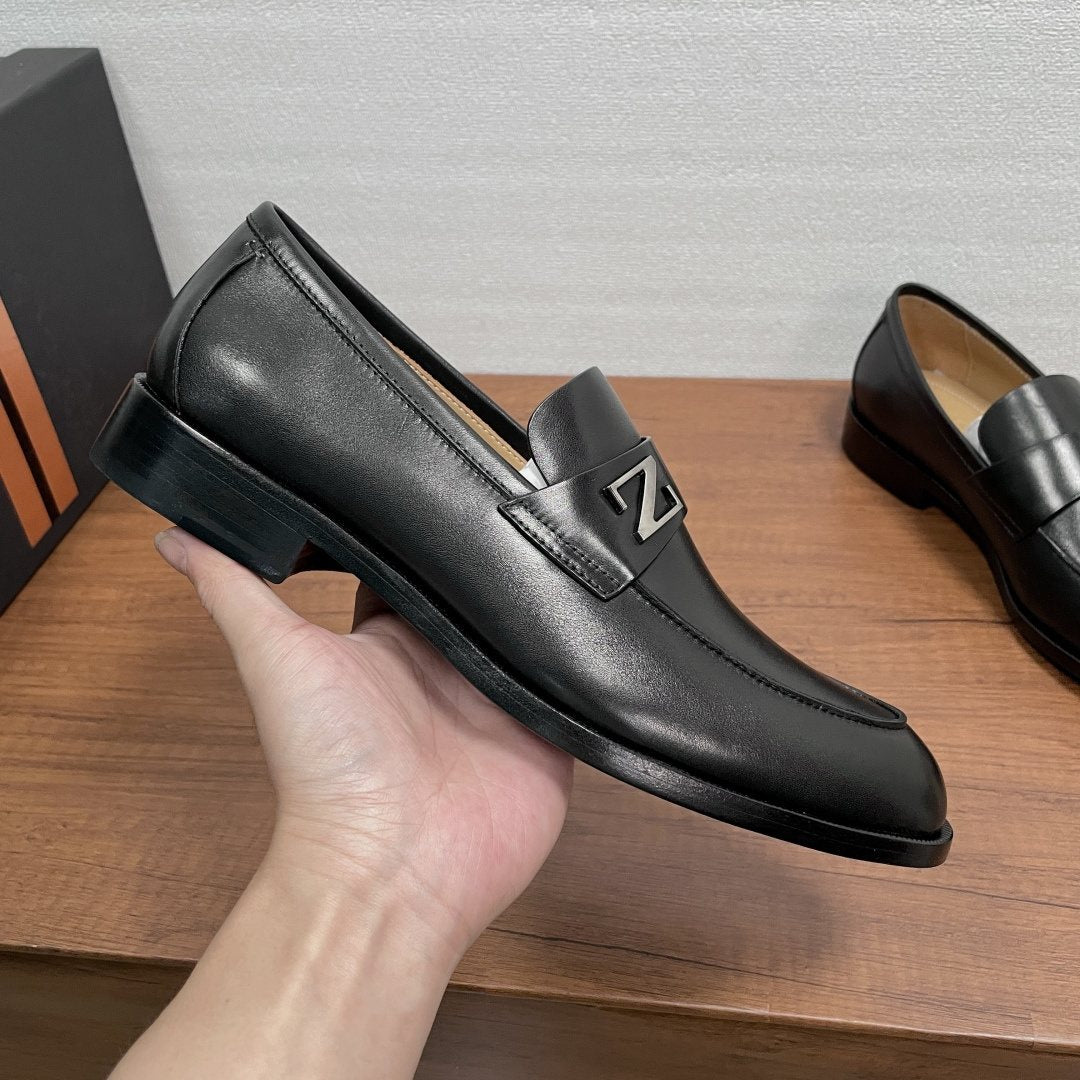 Zegna Black Metal-Accent Loafers — model
