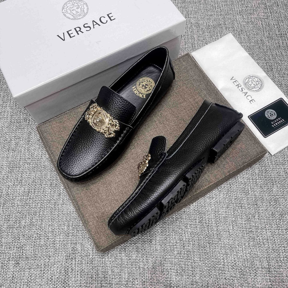 Versace Black Pebbled Leather Loafers — front