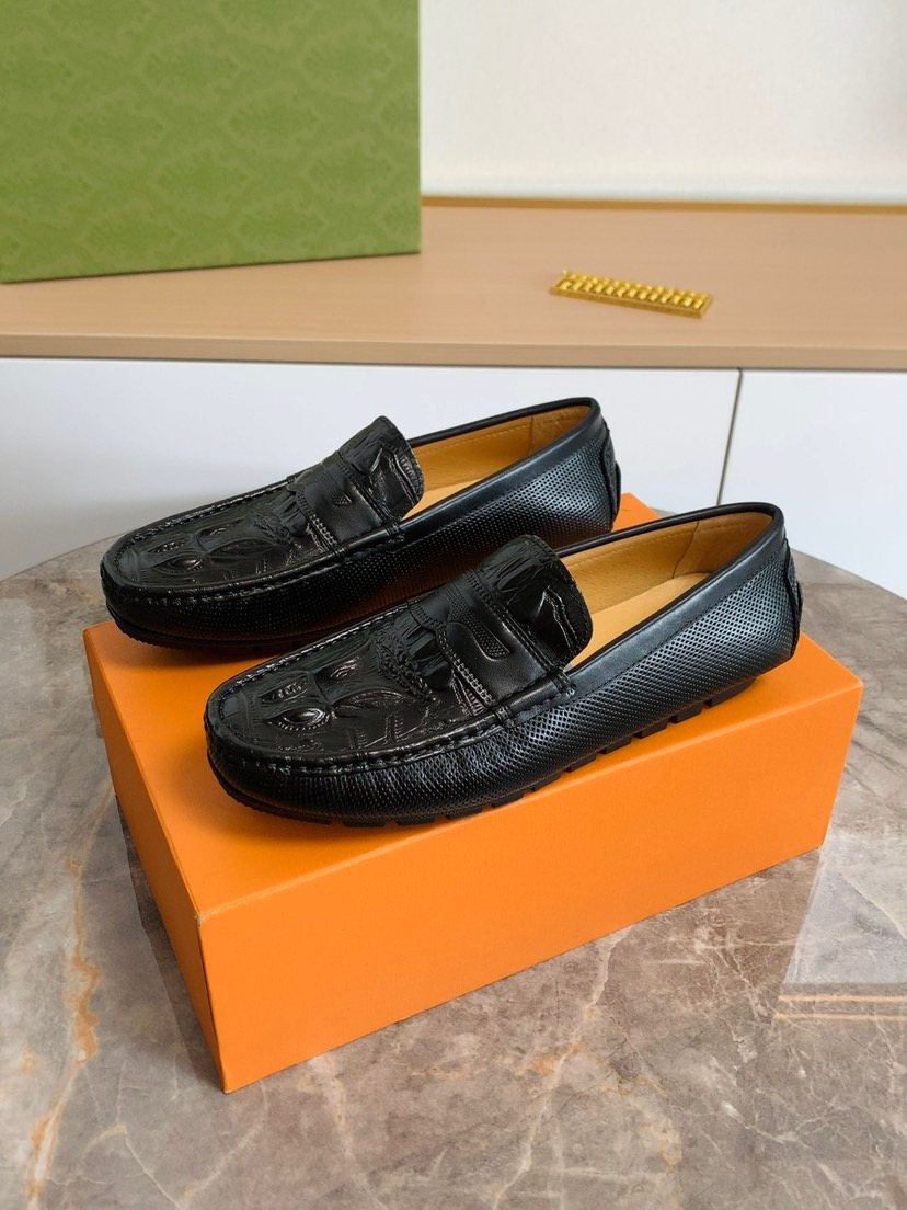 Louis Vuitton Black Textured Leather Loafers — hero