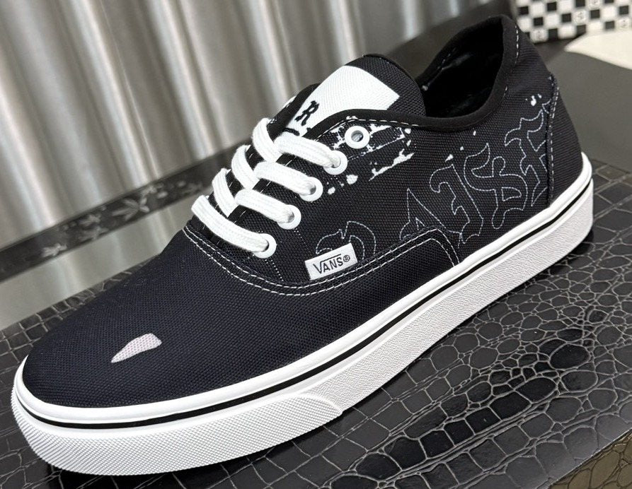 Vans Black Graphic Low-Top Sneakers — hero