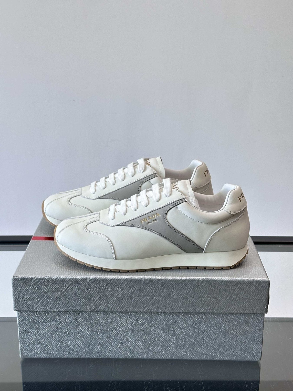 Prada White and Light Gray Sneakers — front