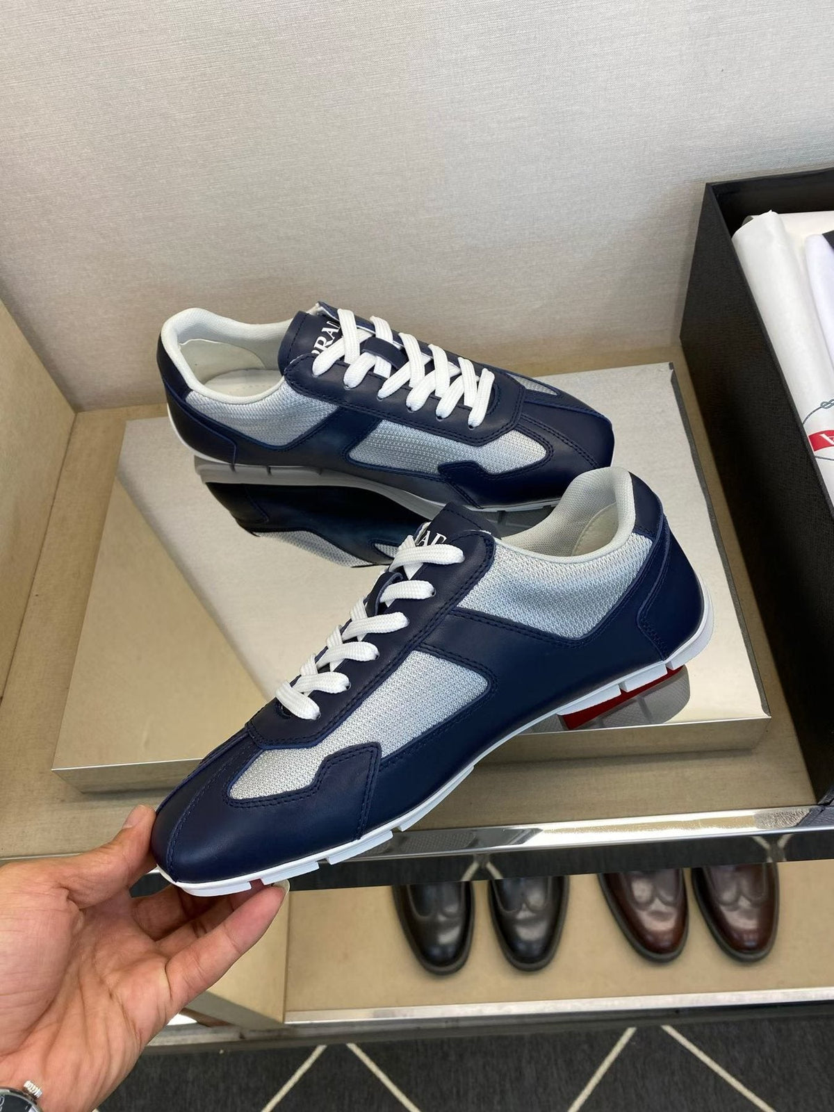 Prada Navy Blue Panel Low-Top Sneakers — model