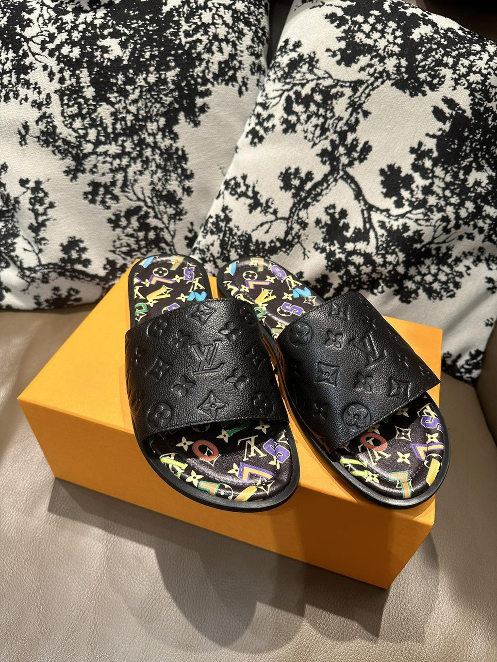 Louis Vuitton Black Embossed Slide Sandals — hero