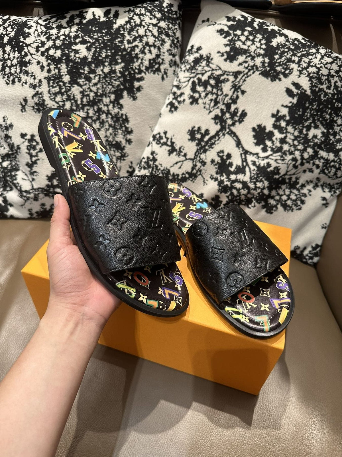 Louis Vuitton Black Embossed Slide Sandals — front