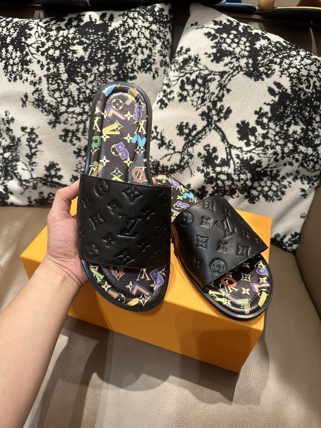 Louis Vuitton Black Embossed Slide Sandals — front