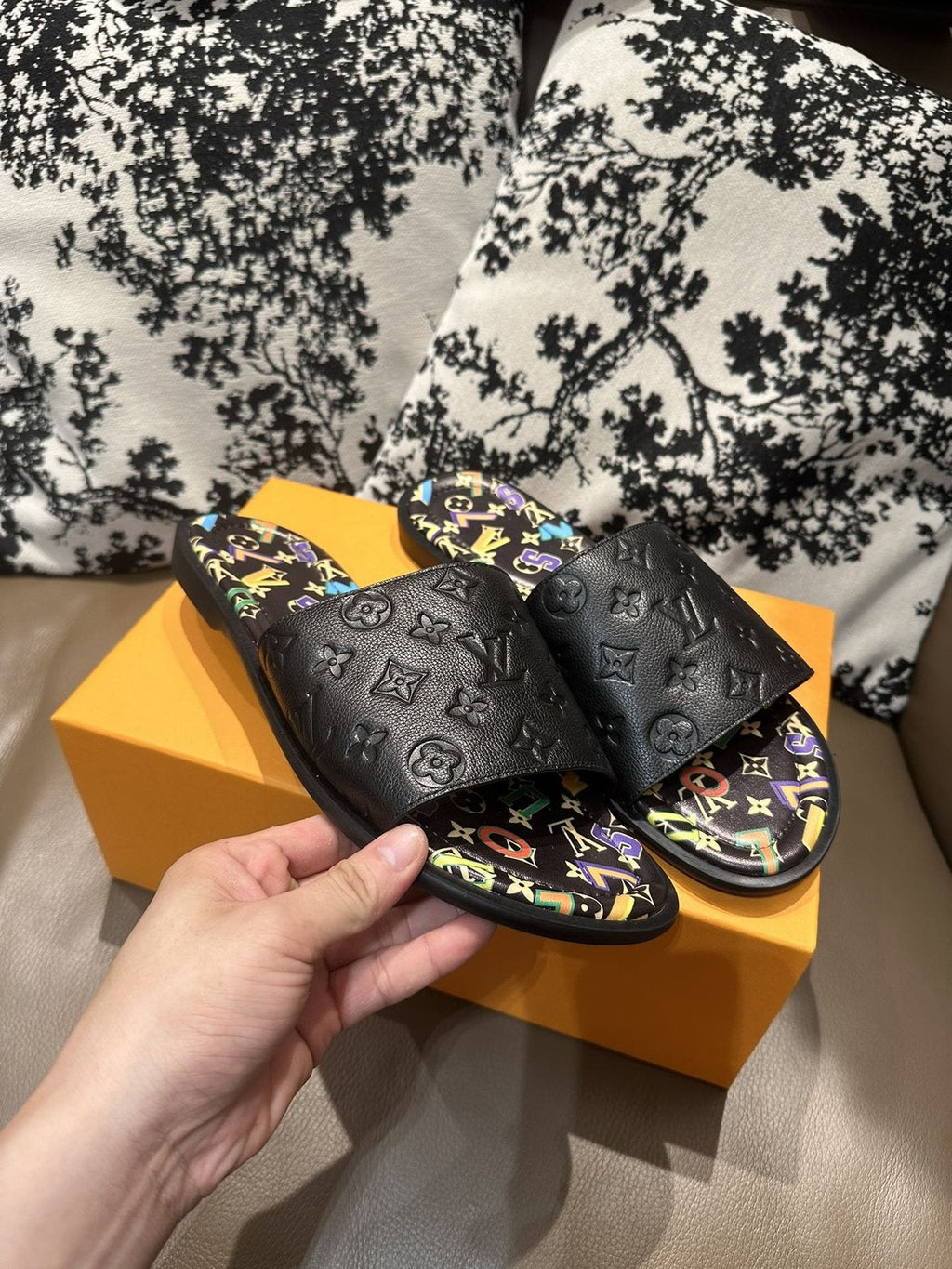 Louis Vuitton Black Embossed Slide Sandals — front
