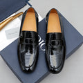 Dior Black Embossed Buckle Loafers — hero