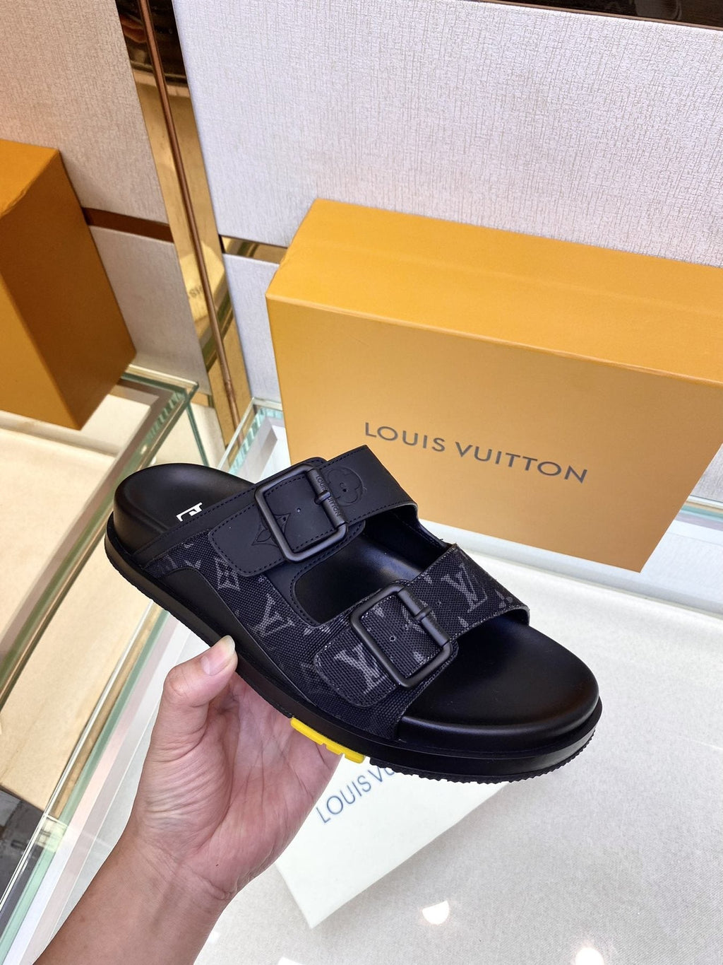 Louis Vuitton Monogram Buckle Slide Sandals — model