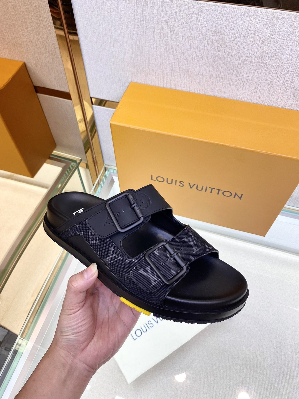 Louis Vuitton Monogram Buckle Slide Sandals — model