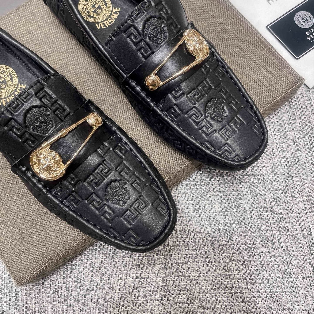 Versace Embossed Medallion Loafers — detail