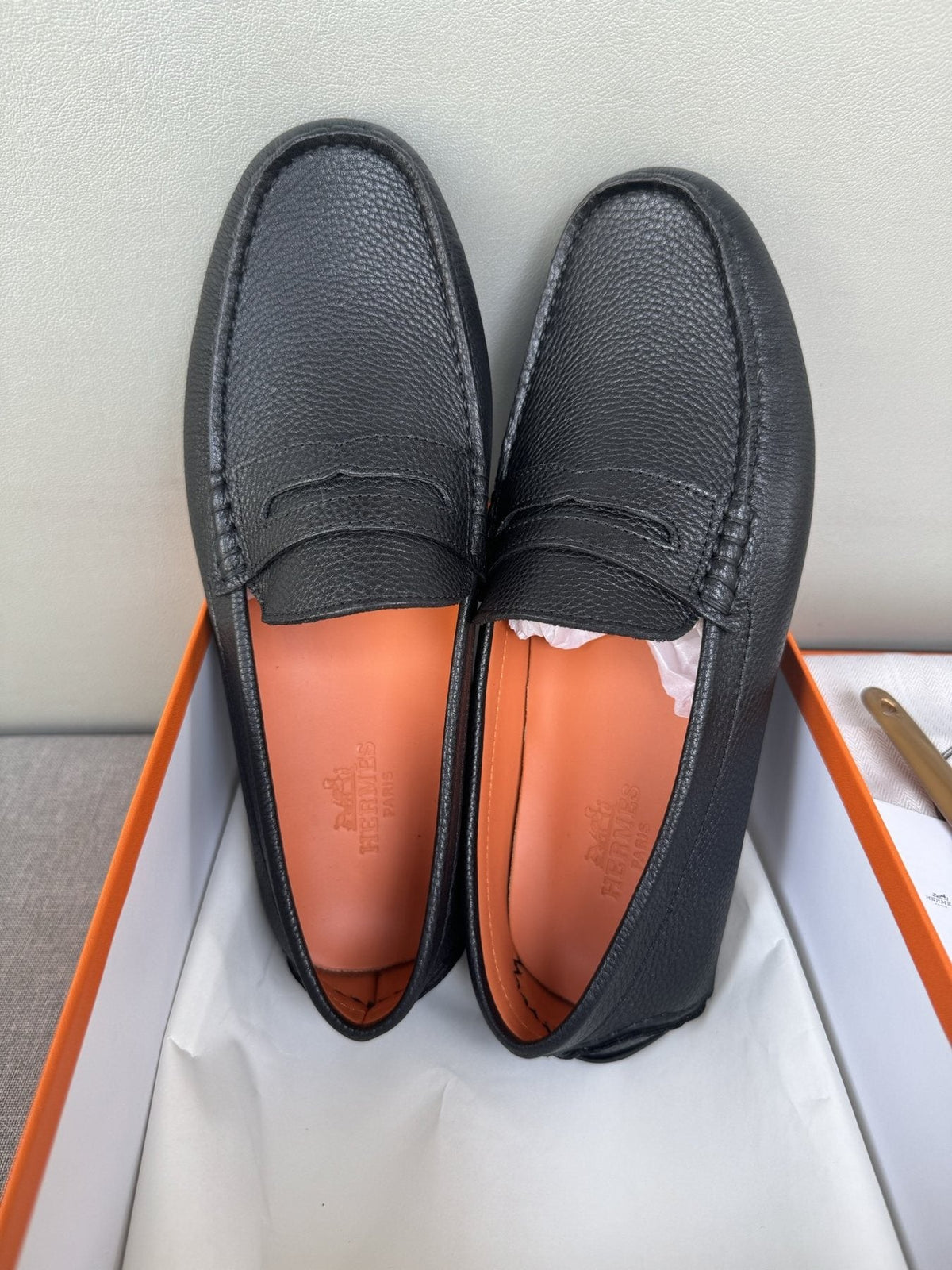 Hermès Black Textured Penny Loafers — front