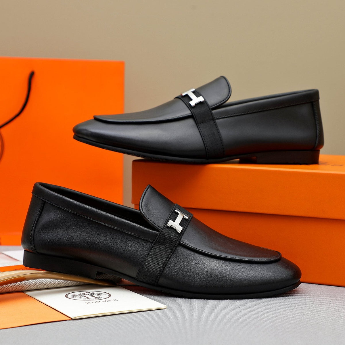 Hermès Black H-Hardware Slip-On Loafers — front