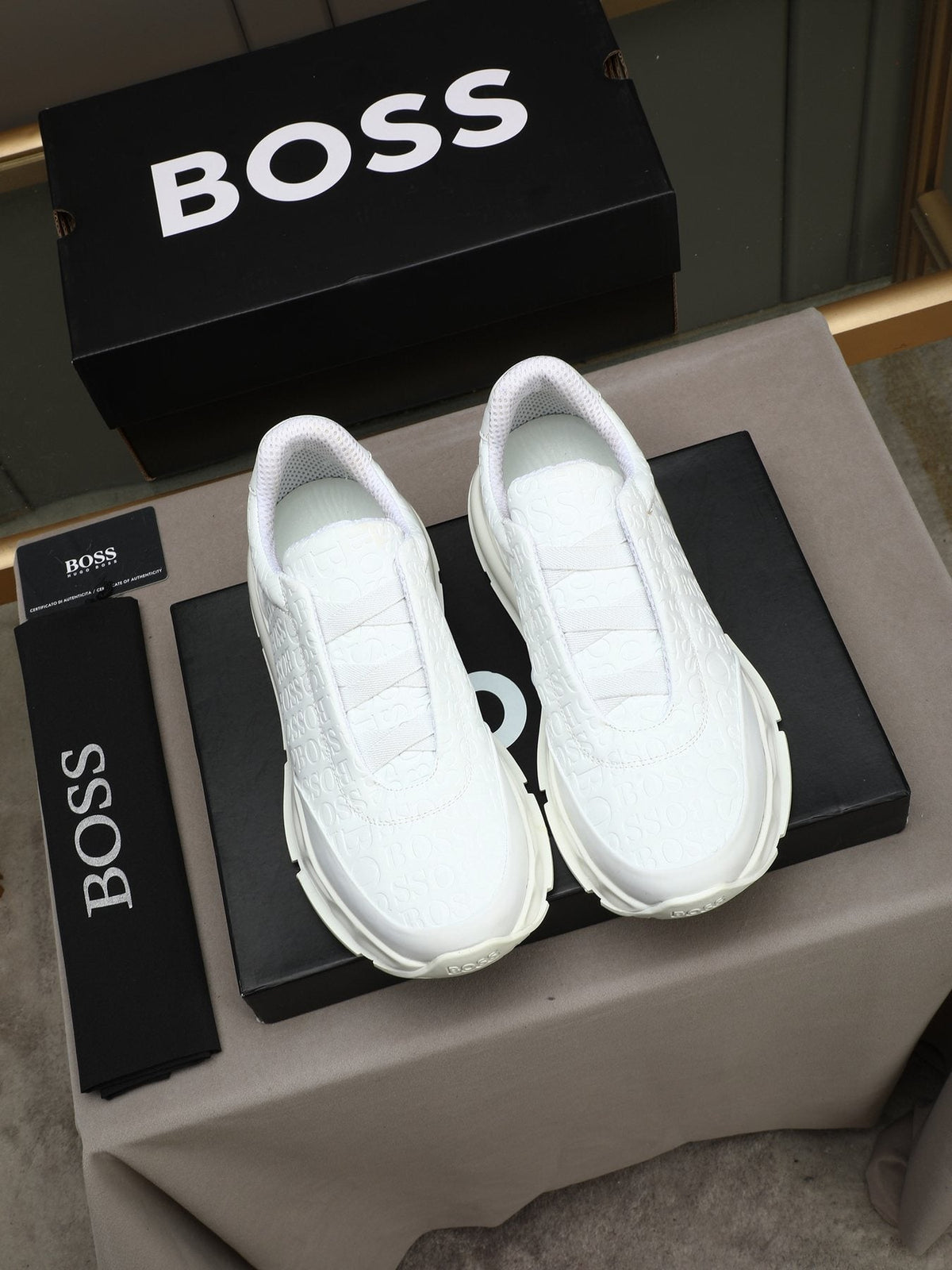 BOSS White Embossed Low-Top Sneakers — front