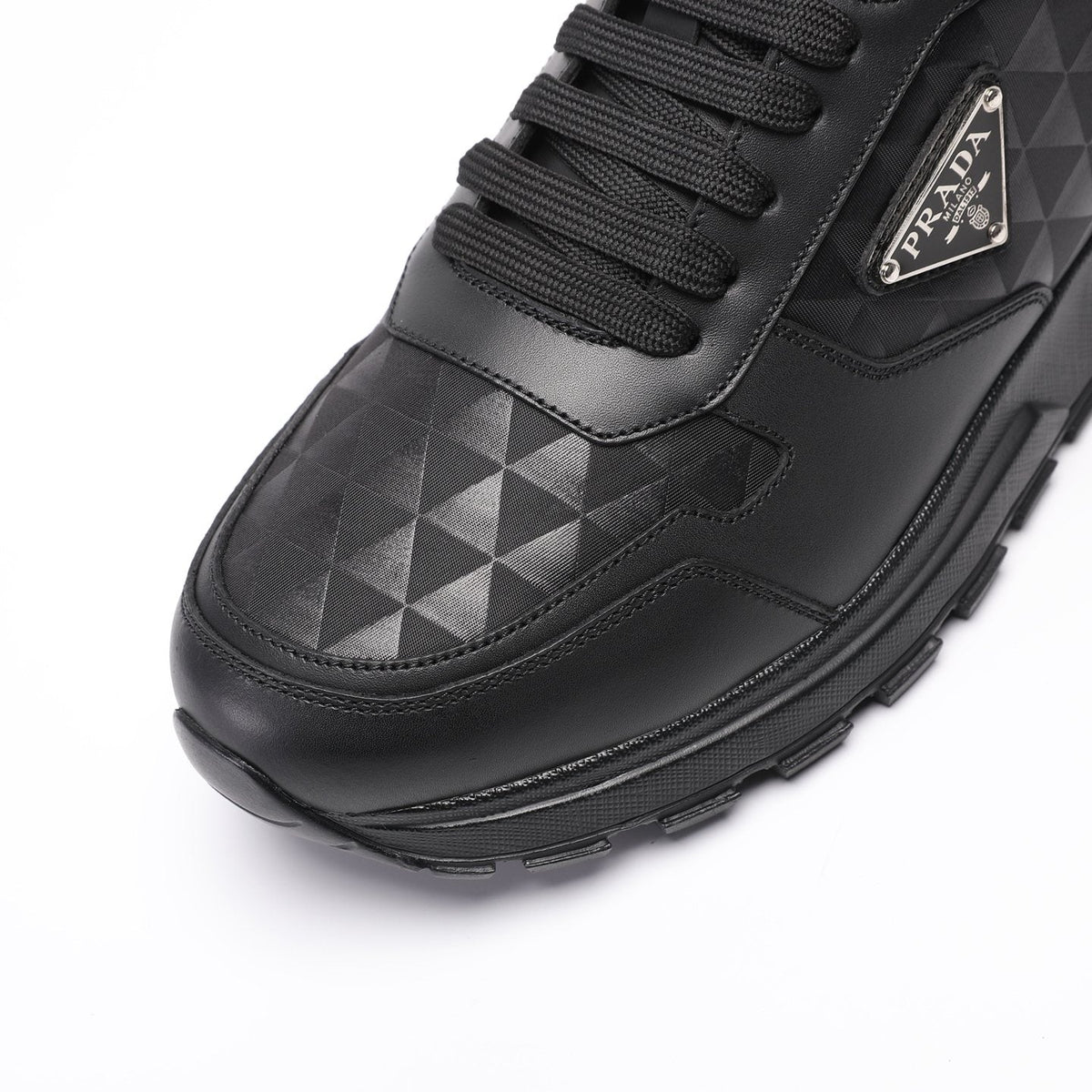Prada Black Triangle-Plaque Sneakers — detail