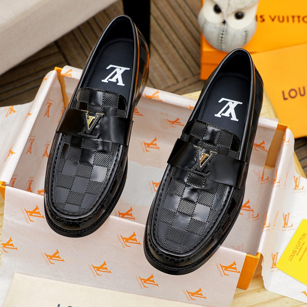 Louis Vuitton Black Woven Leather Loafers — front