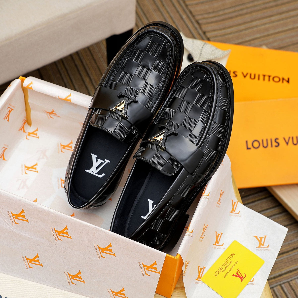 Louis Vuitton Black Woven Leather Loafers — front