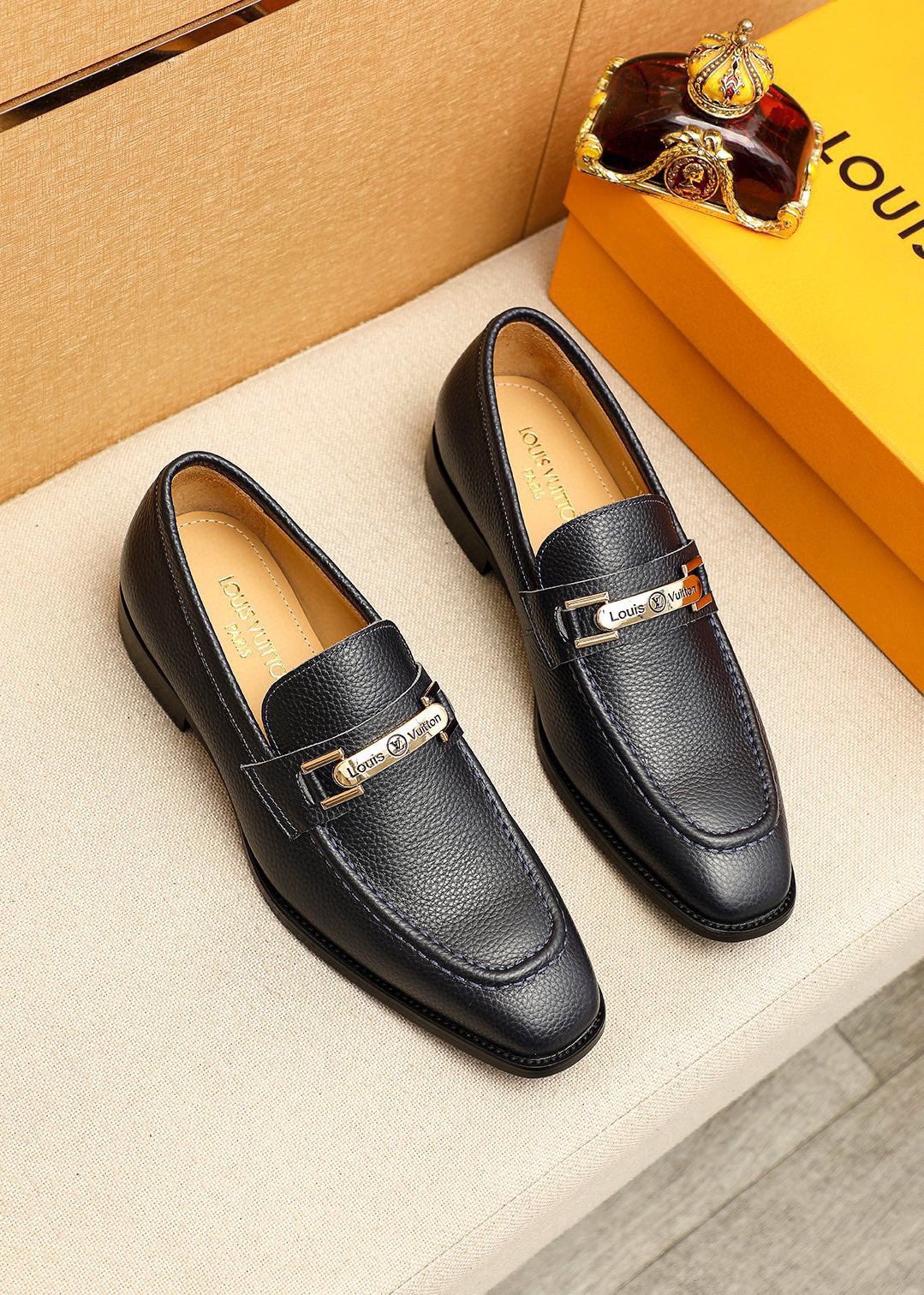 Louis Vuitton Black Pebbled Bar Loafers — front