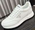 Prada White Textured Low-Top Sneakers — hero