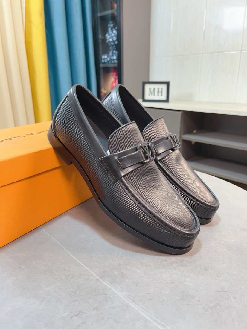 Louis Vuitton Black Textured Bar Slip-On Shoes — front