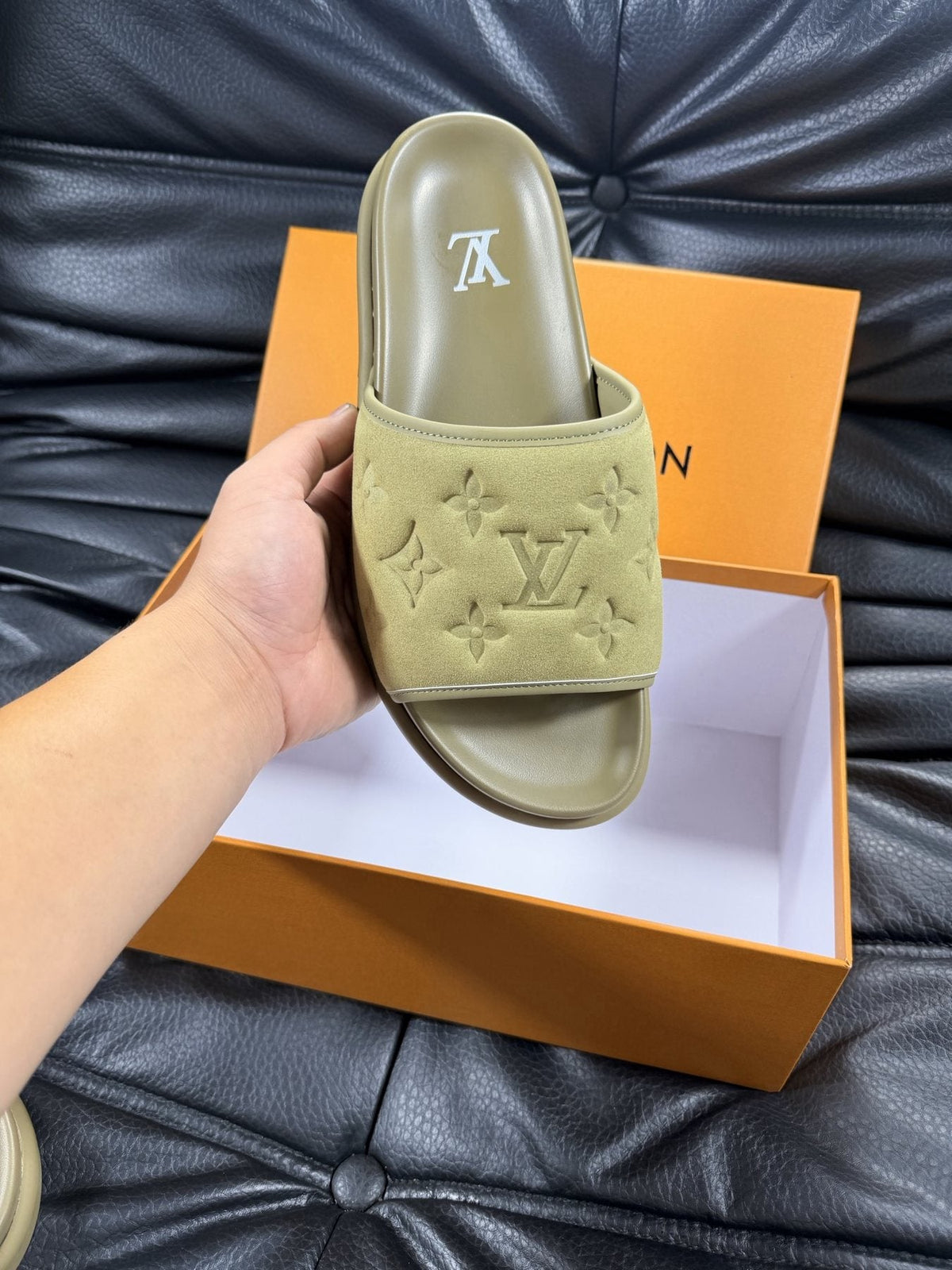 Louis Vuitton Embossed Slide Sandals — model