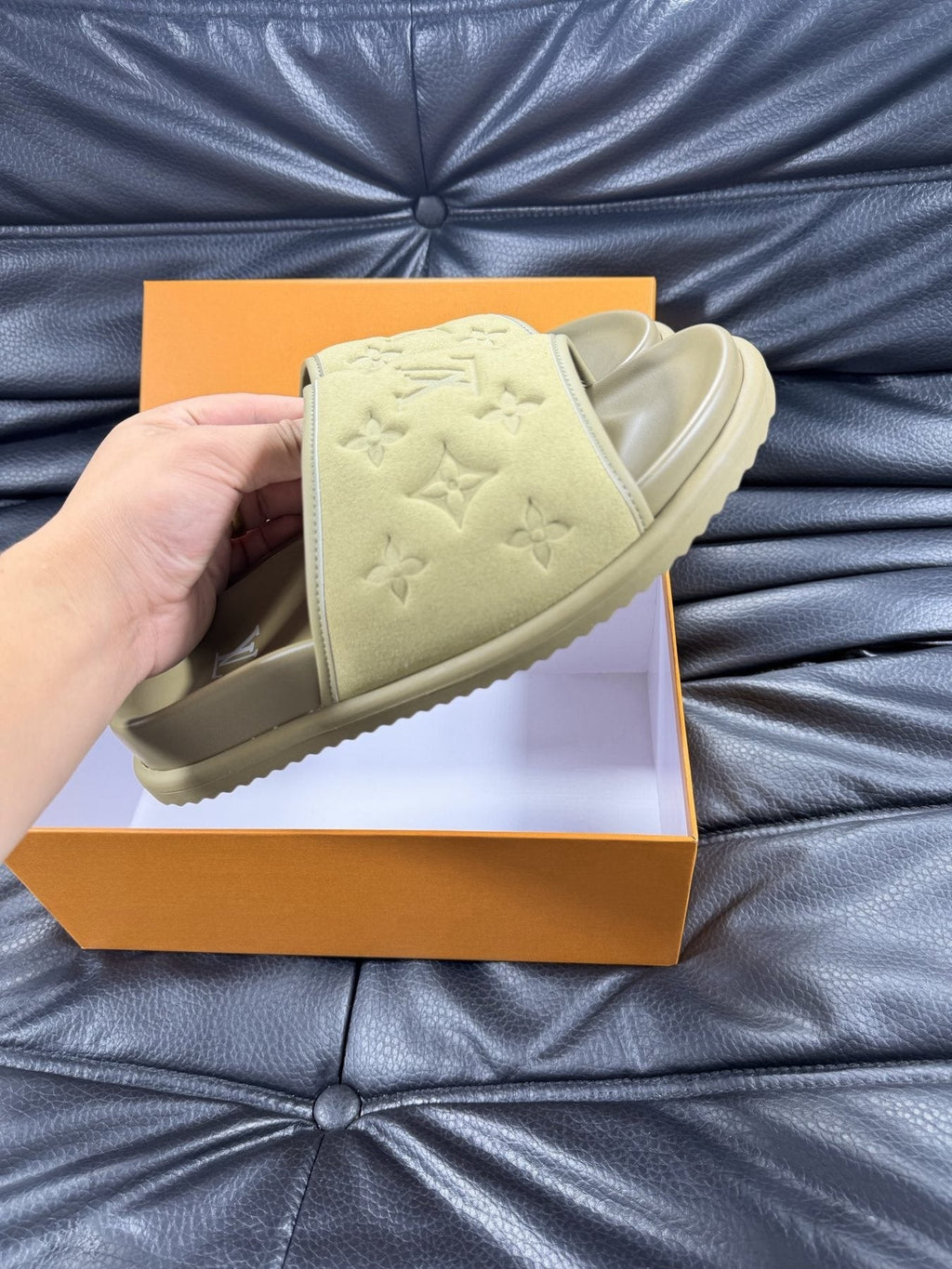 Louis Vuitton Embossed Slide Sandals — model