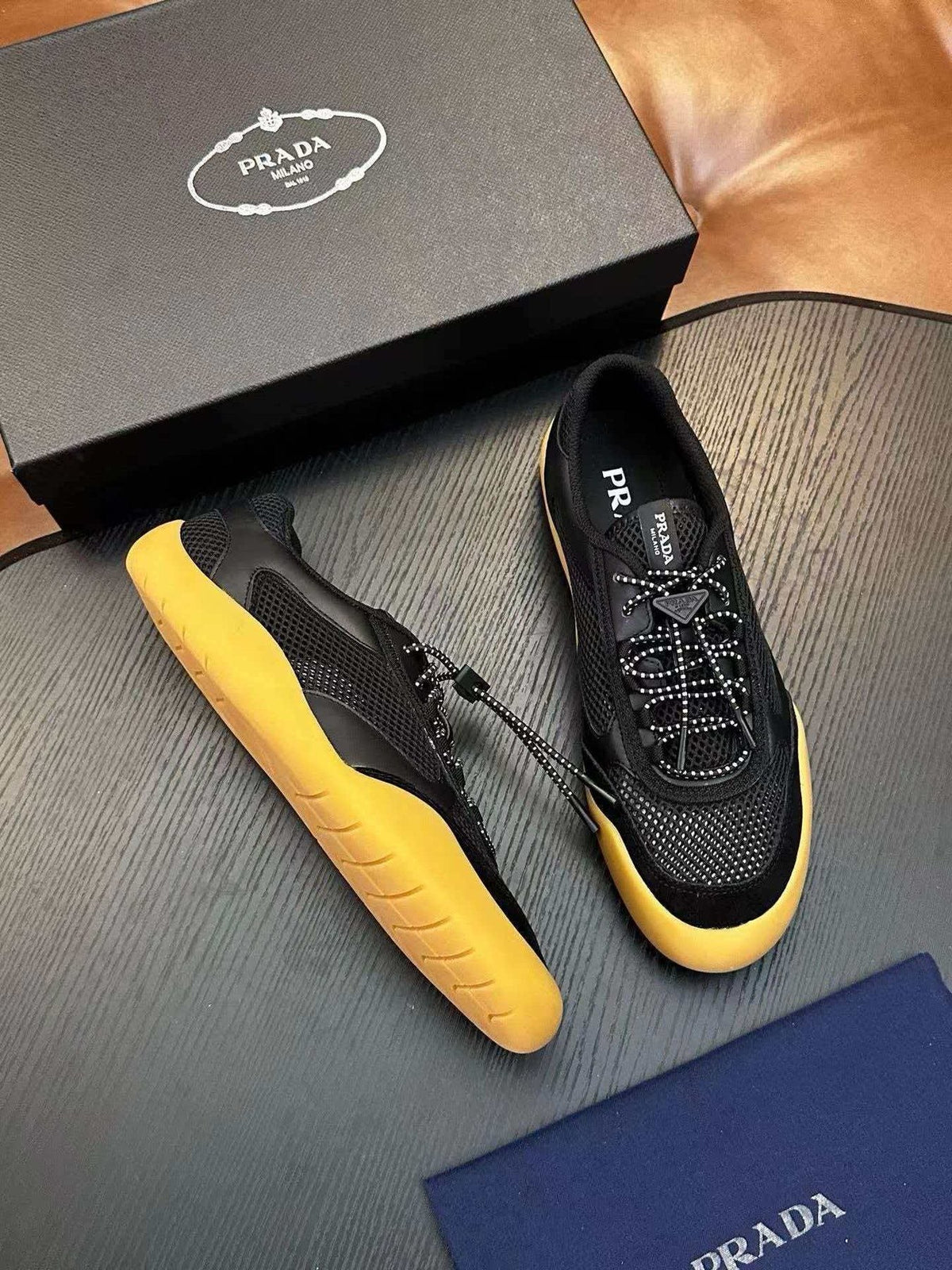 Prada Black Sneakers with Yellow Sole — front