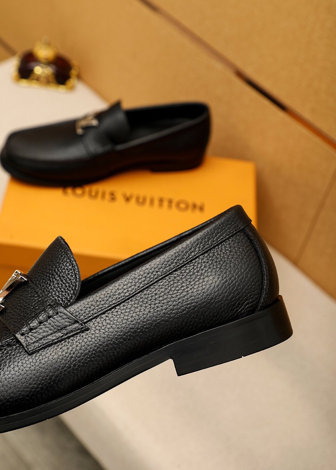 Louis Vuitton Black Pebbled Loafers — side