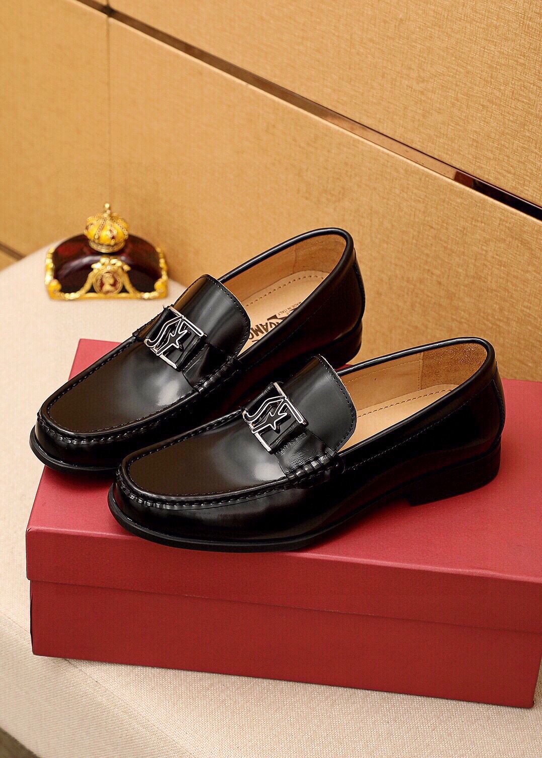 Ferragamo Black Leather Hardware Loafers — front