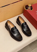 Ferragamo Black Leather Hardware Loafers — hero