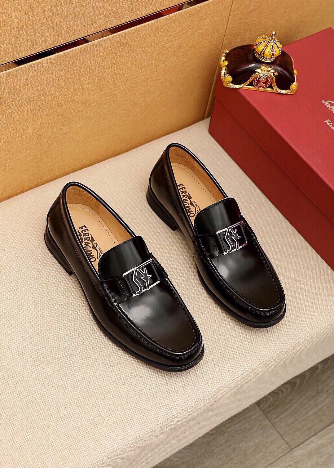 Ferragamo Black Leather Hardware Loafers — hero