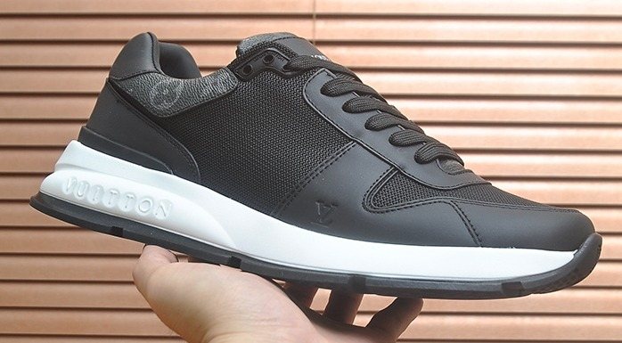 Louis Vuitton Black Leather Low-Top Sneakers — front