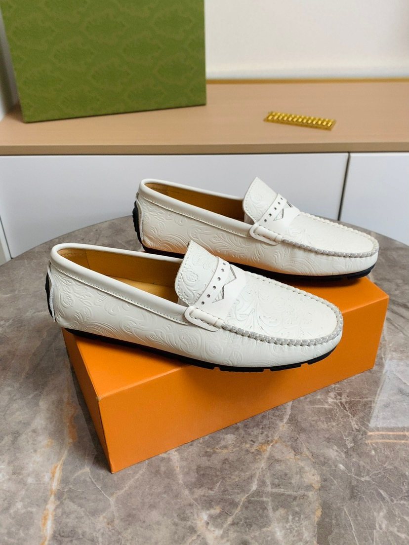 Louis Vuitton White Leather Moc-Toe Loafers — hero