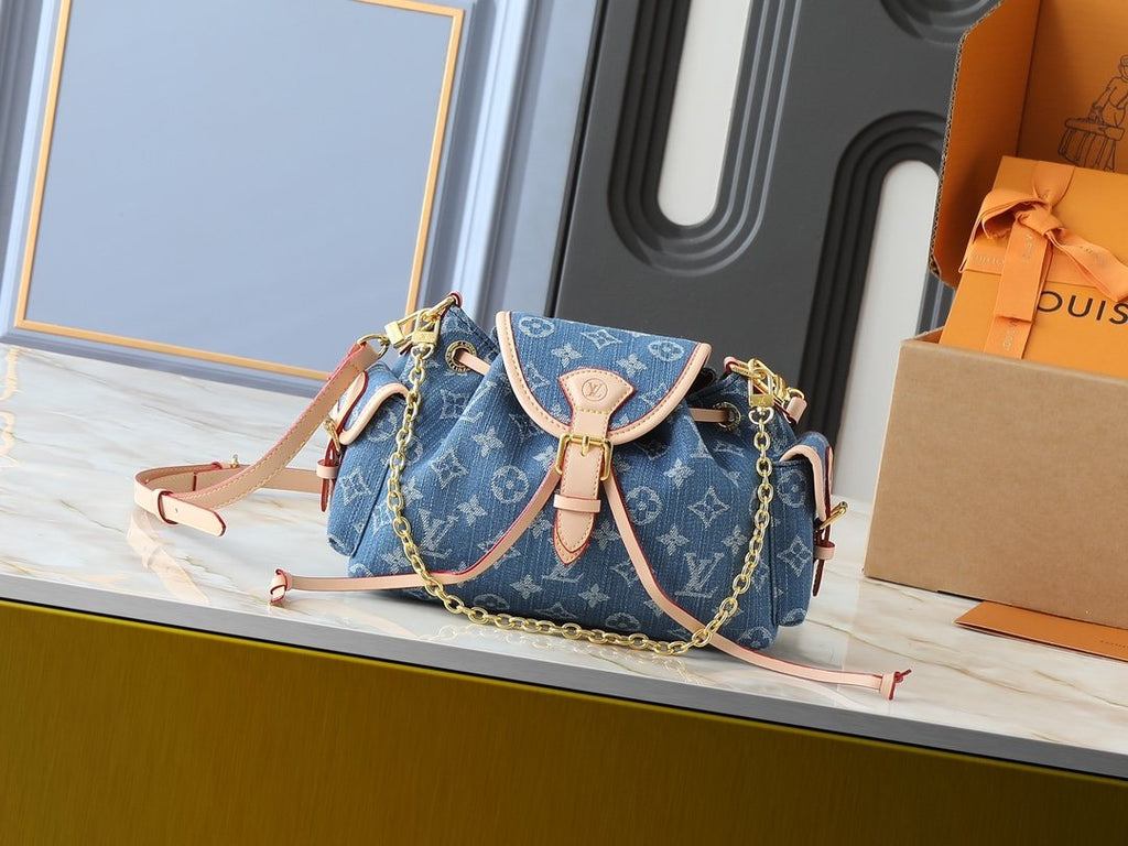 Louis Vuitton Odyssée Backpack Handbag — front