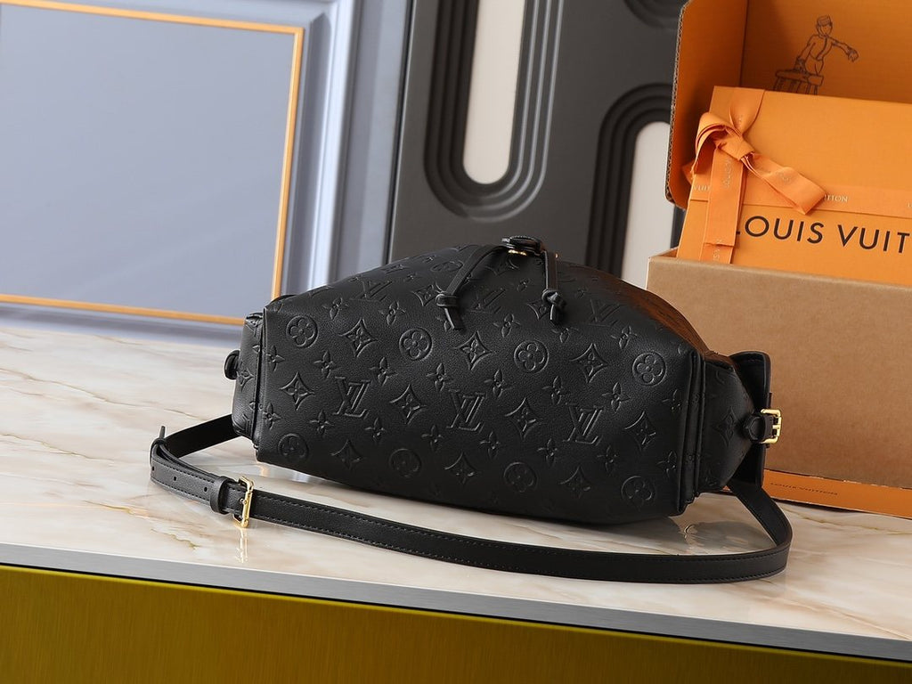 Louis Vuitton Odyssée Backpack Handbag — side