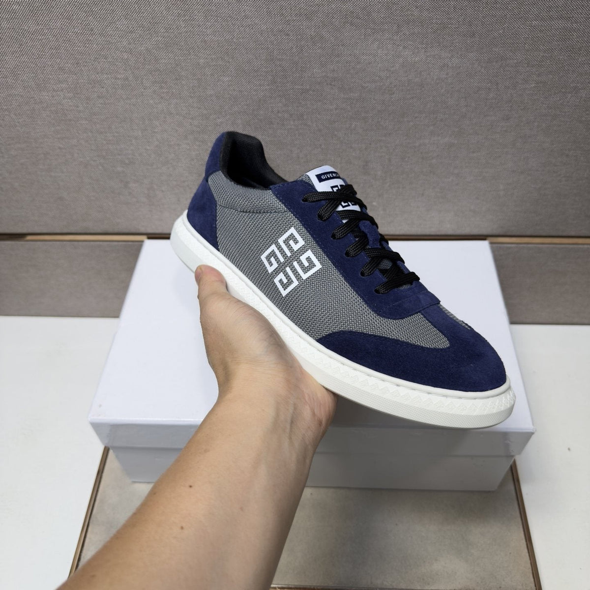 Givenchy Geometric Emblem Low-Top Sneakers — model
