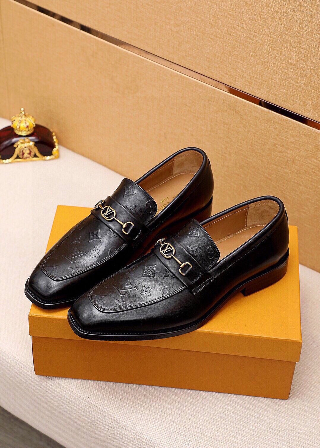Louis Vuitton Embossed Buckle Loafers — front