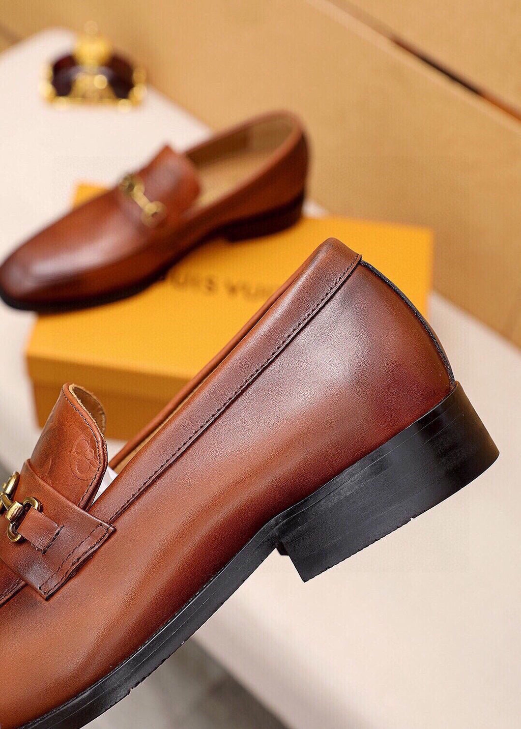 Louis Vuitton Embossed Buckle Loafers — detail
