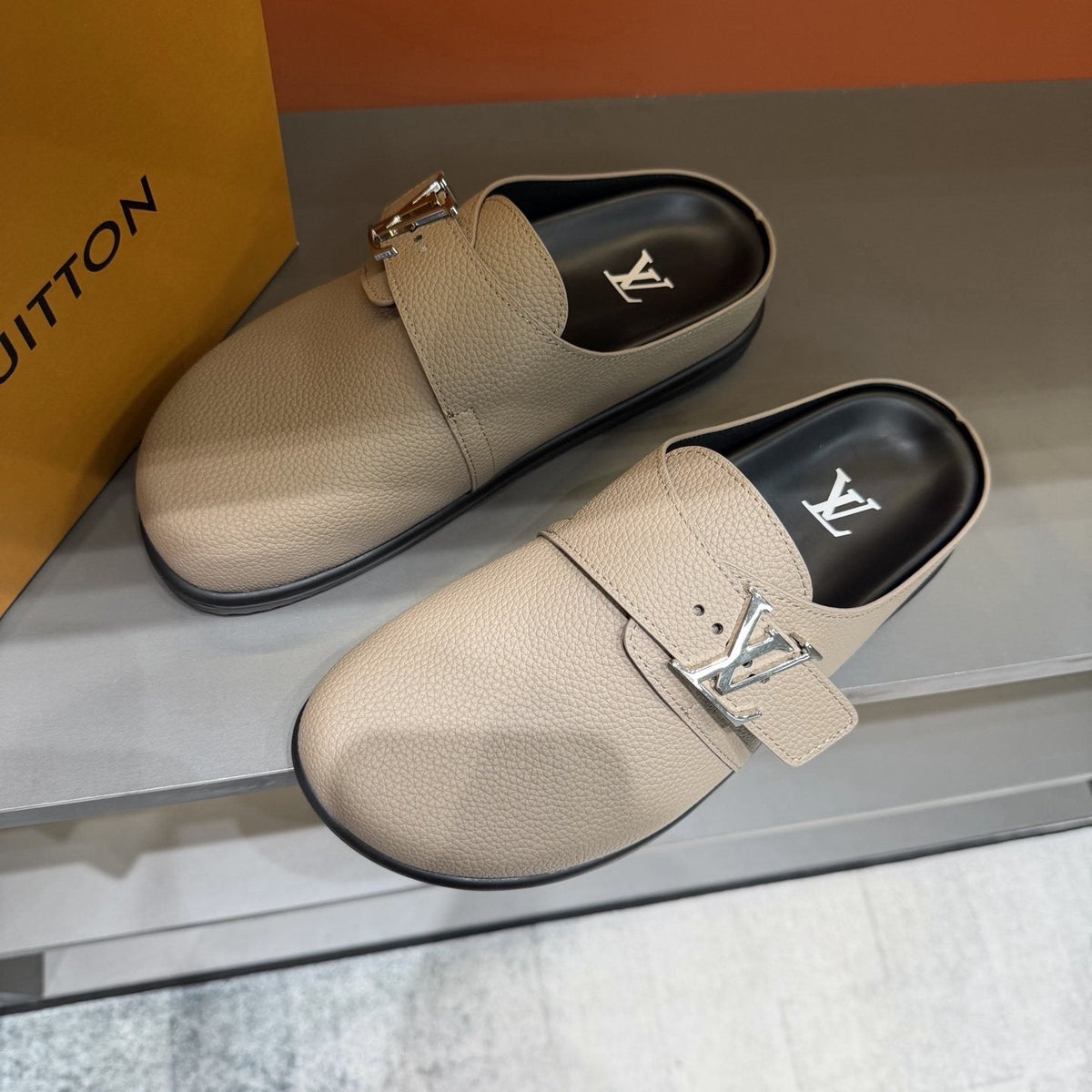 Louis Vuitton Textured Buckle Slide Sandals — front