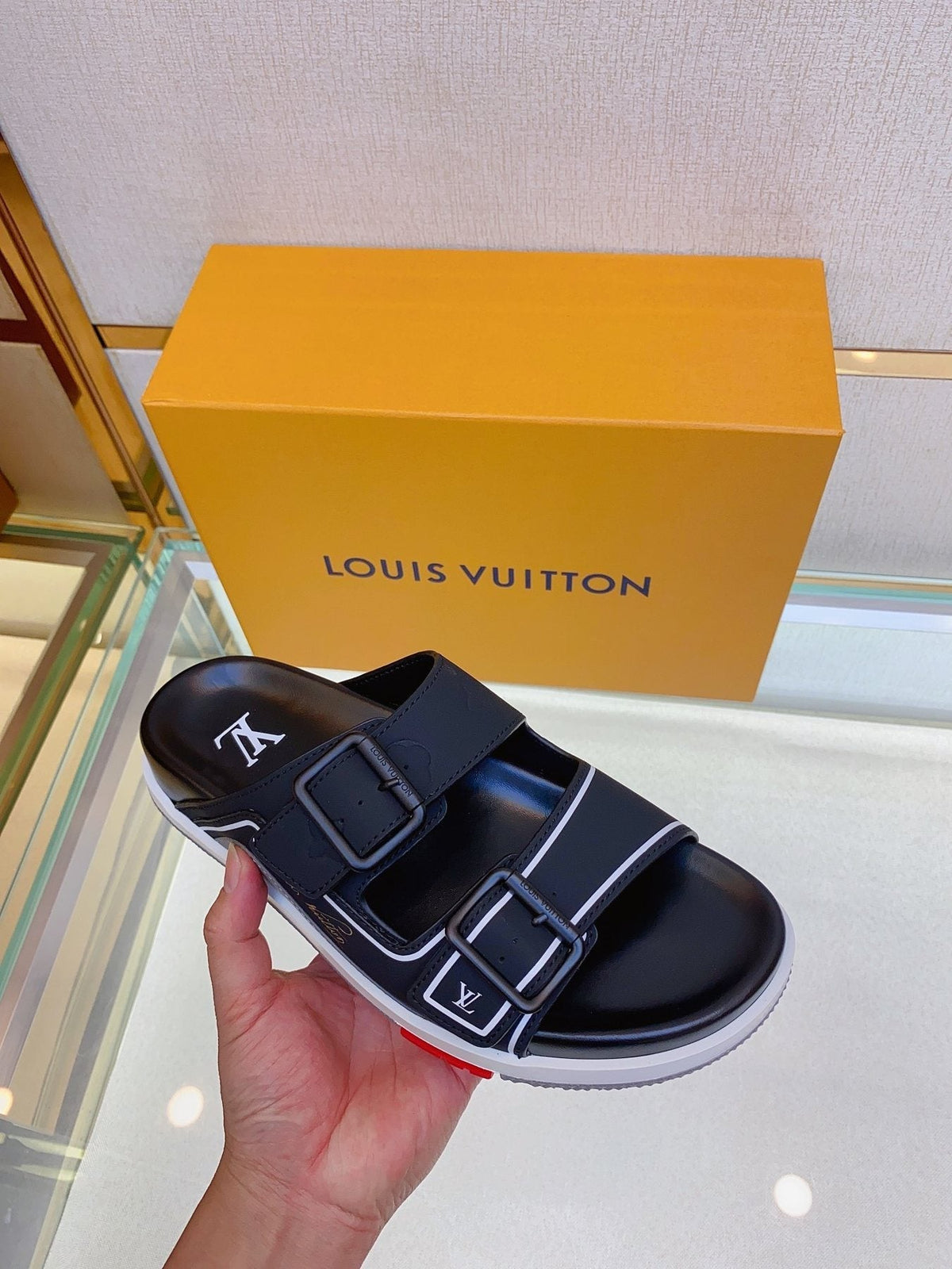 Louis Vuitton Two-Buckle Slide Sandals — model