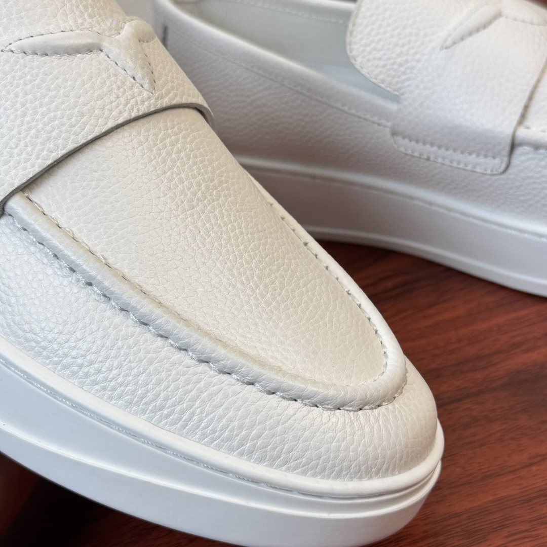 Louis Vuitton White Slip-On Loafers — detail
