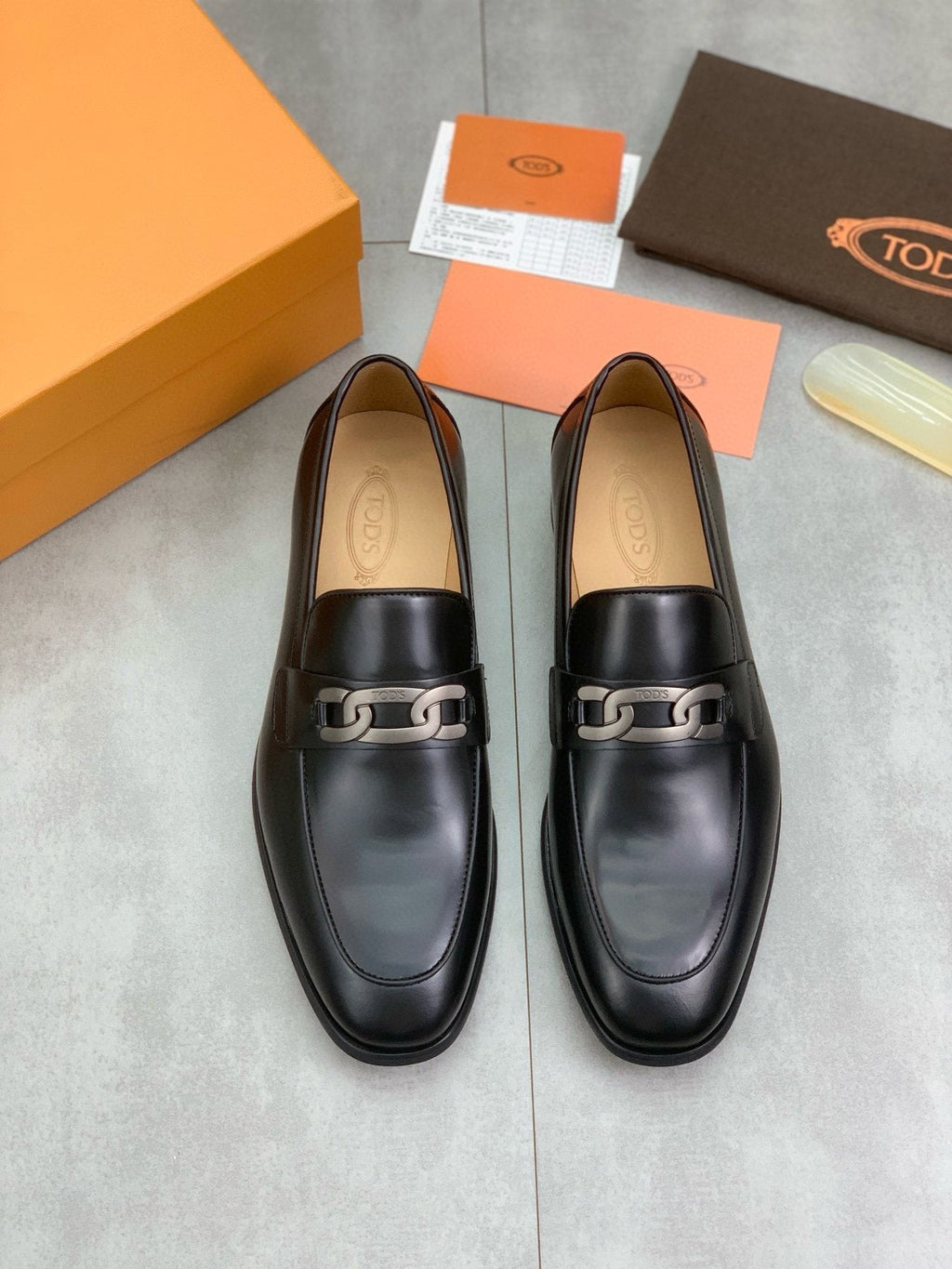 TOD'S Black Metal-Accent Loafers — front