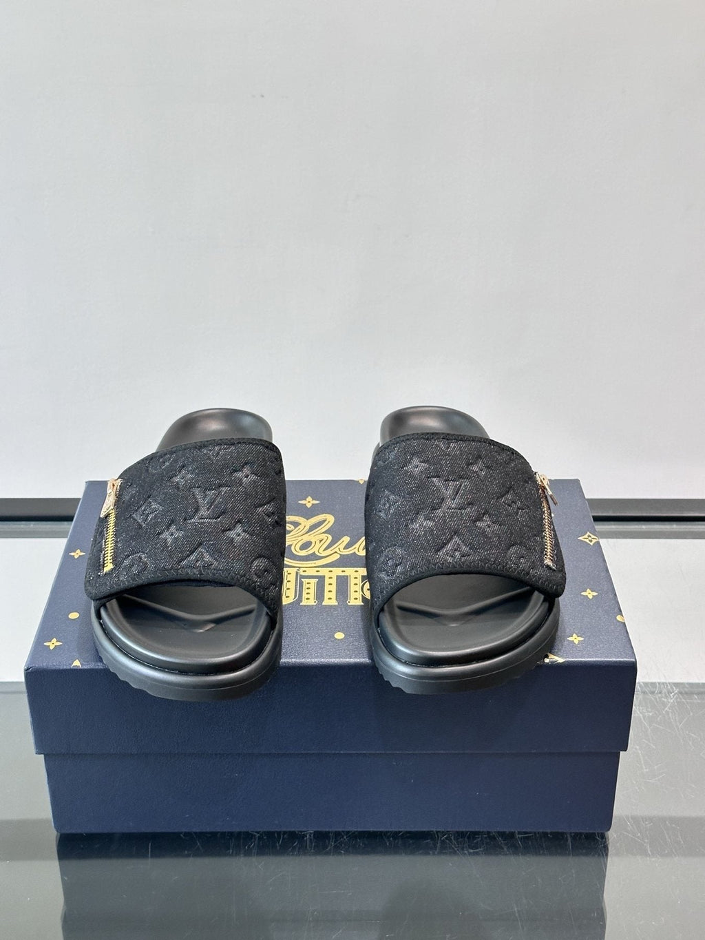 Louis Vuitton Embossed Monogram Slide Sandals — front