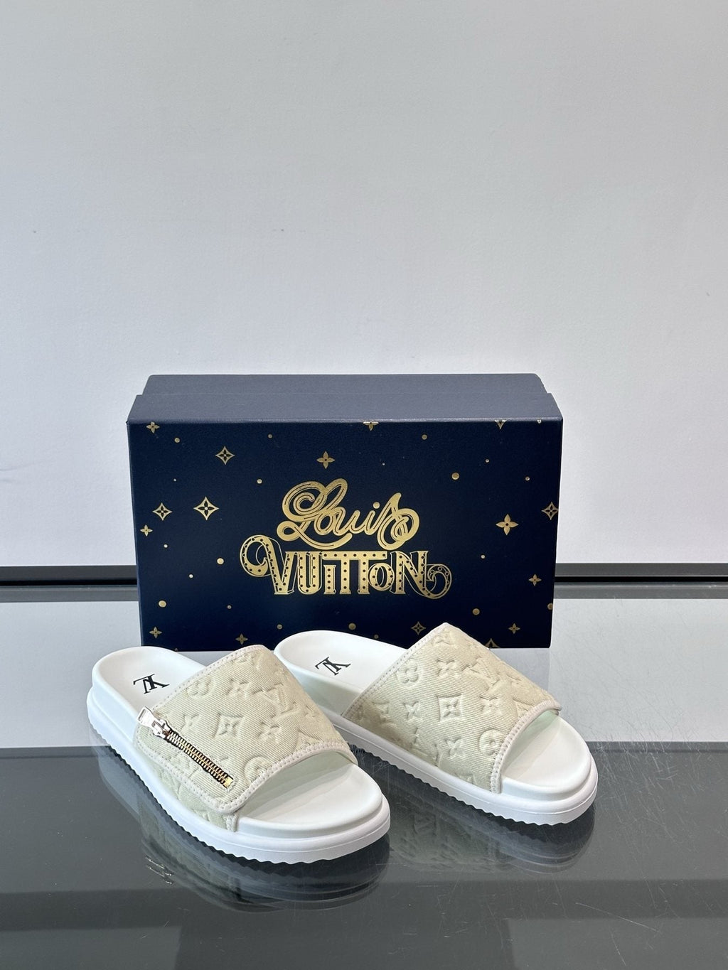 Louis Vuitton Embossed Monogram Slide Sandals — front