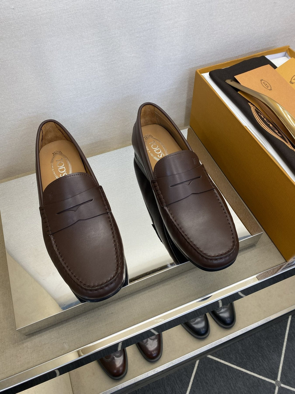 Tod's Textured Penny Loafers — front